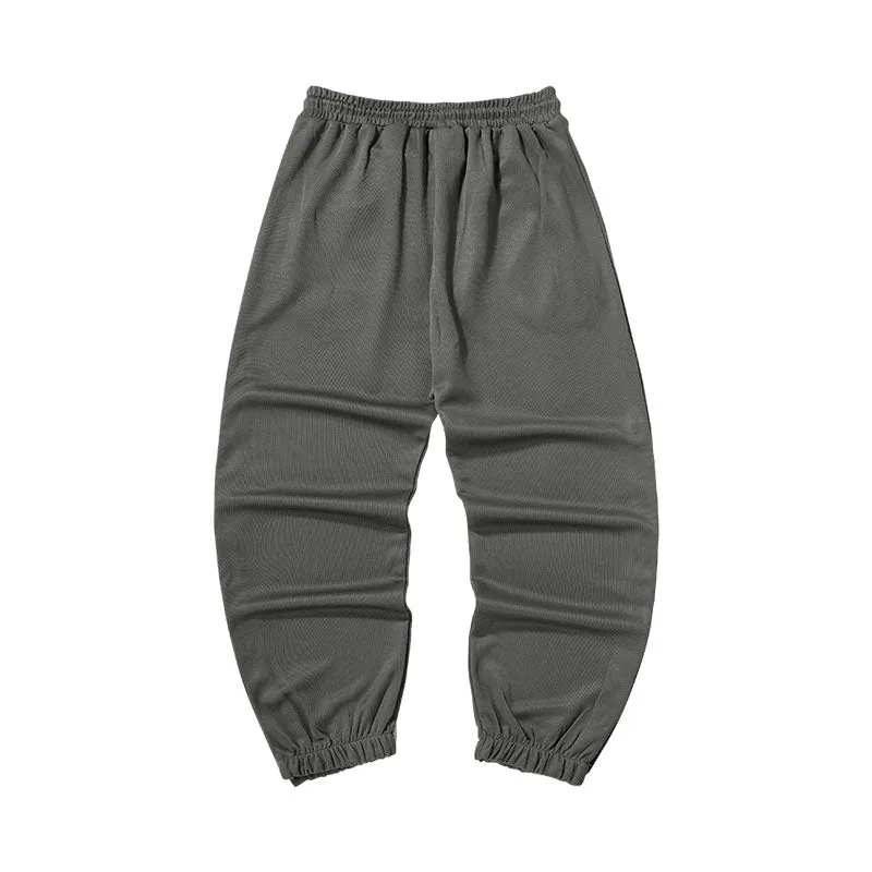 Street sports style letter label open and close self-adjusting laser buckle leg casual pants